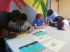 Blind and visually impaired students assisted by teachers and researchers