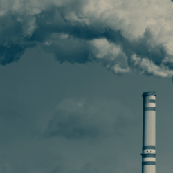 Industrial chimneys polluting directly into atmosphere