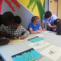Blind and visually impaired students assisted by teachers and researchers